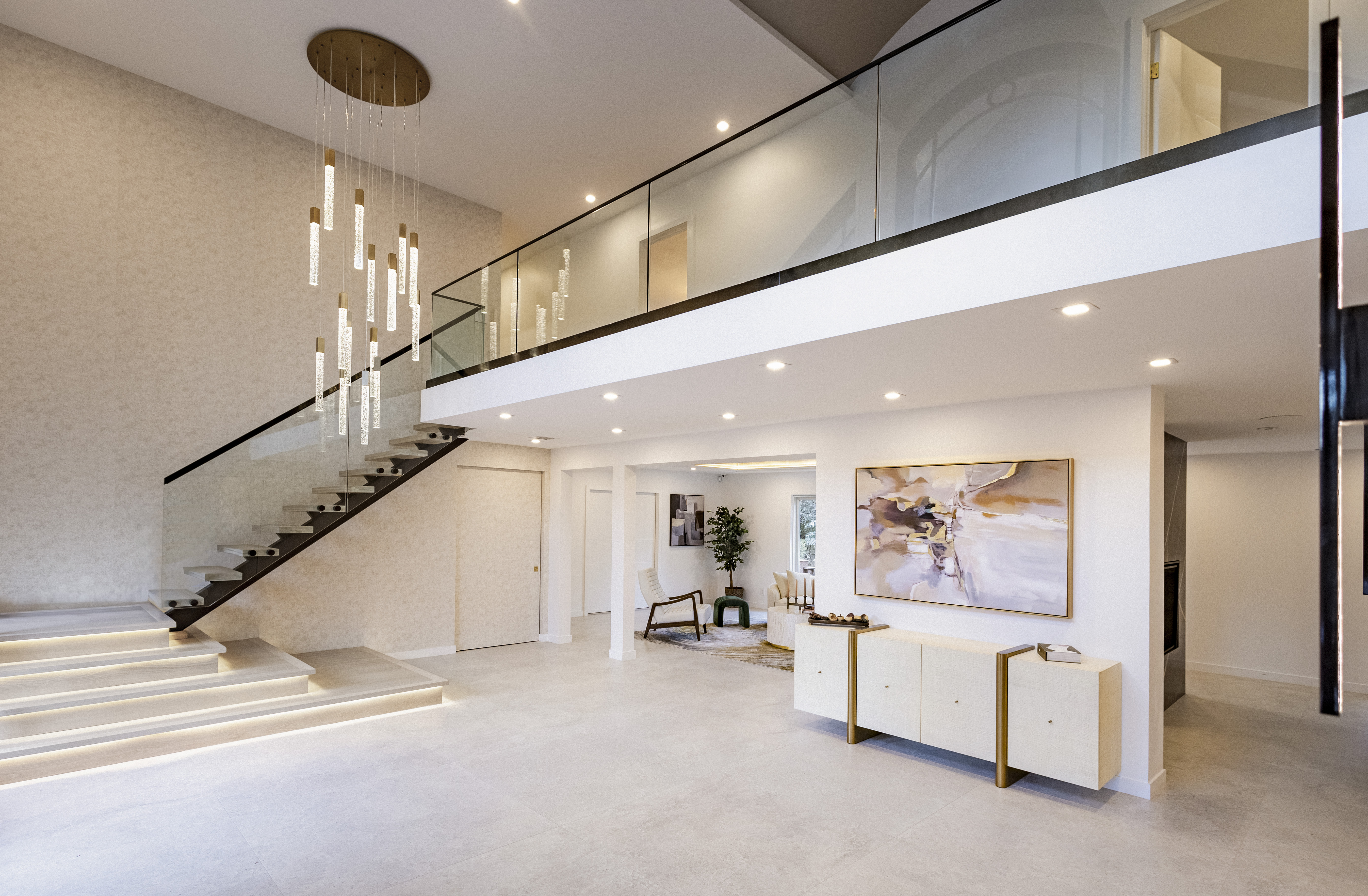 Everit Residence wide entry view showing full double-height space