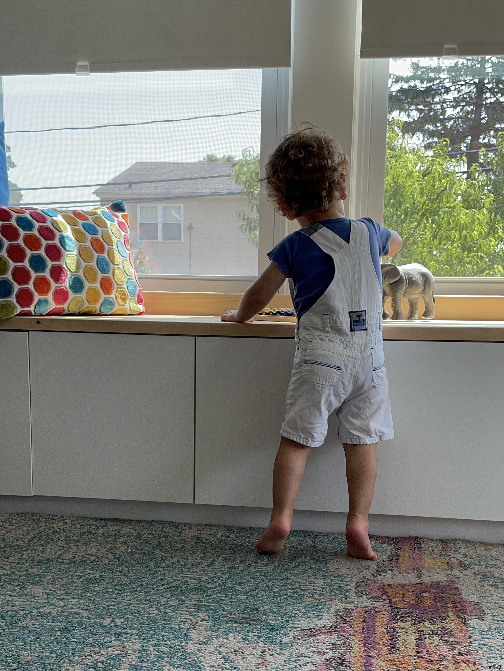 Completed bench storage along the window wall